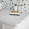 Plan de toilette UNIIQ pierre compacte pour vasque à poser - 910 et 1210 mm, droite ou gauche, 2 finitions